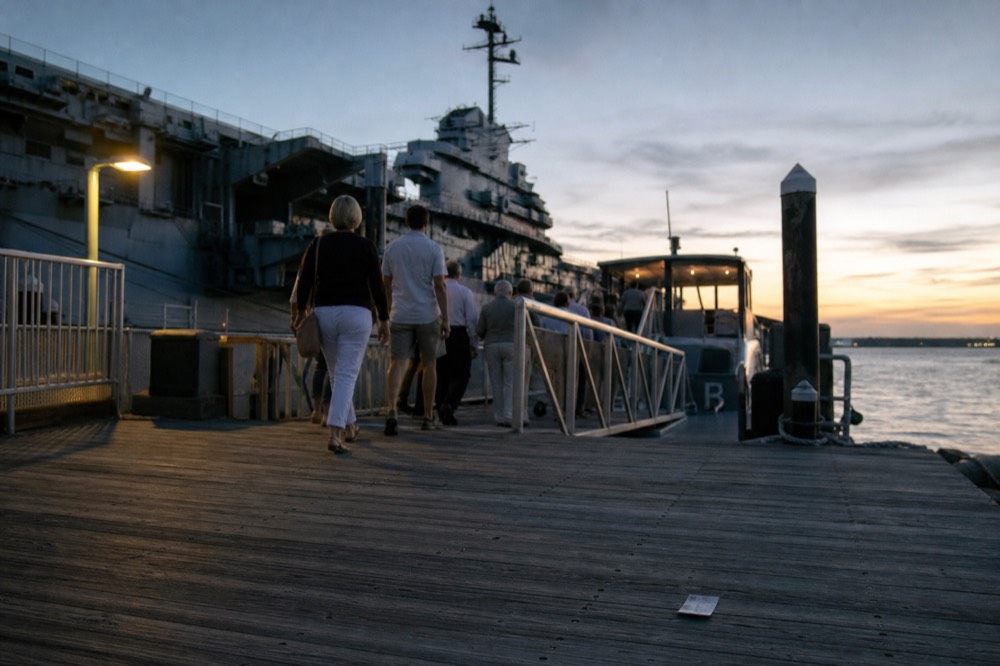 Patriots Point dock with USS Yorktown in background, no text, no logos, no people