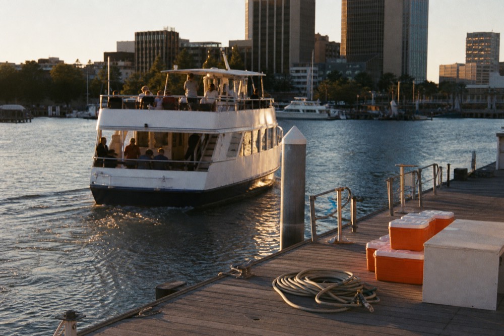 Sunset cruise boat on Charleston harbor, no text, no logos, no people