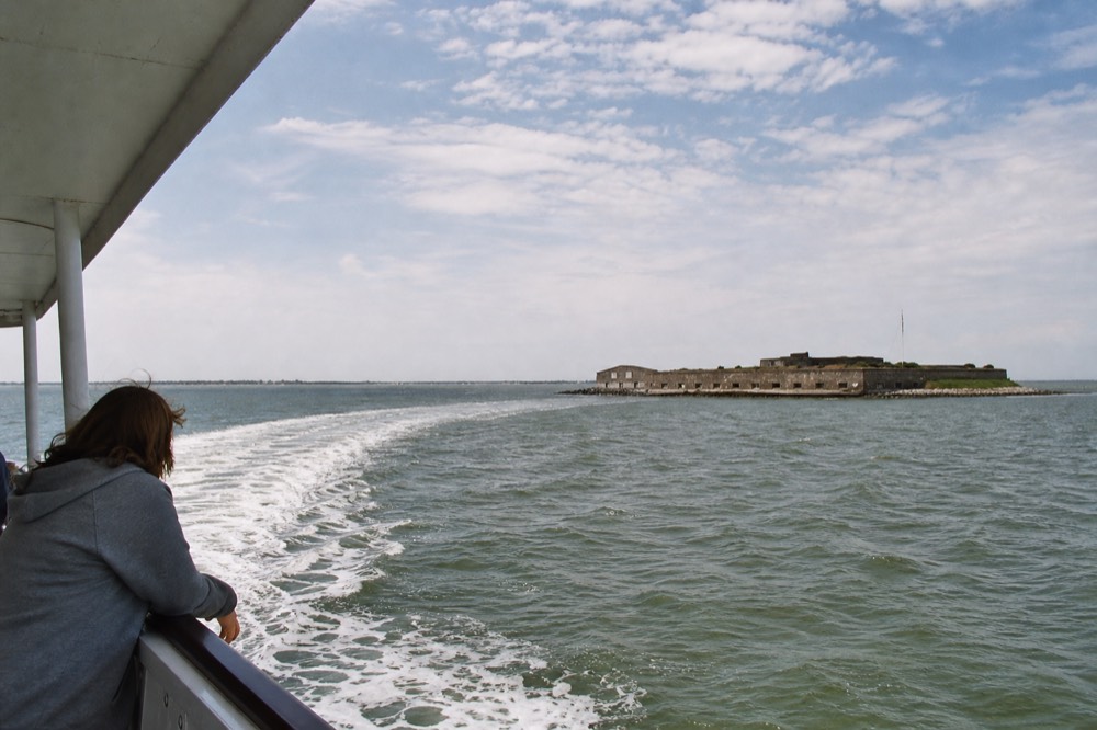 Historic harbor tour boat passing Fort Sumter, no text, no logos, no people