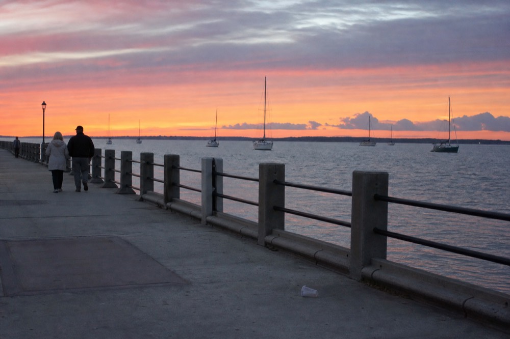 Charleston harbor in autumn with colorful sky, no text, no logos, no people